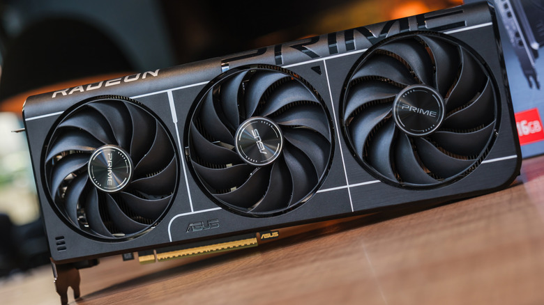 ASUS Prime Radeon RX 9060 XT graphics card with three cooling fans.