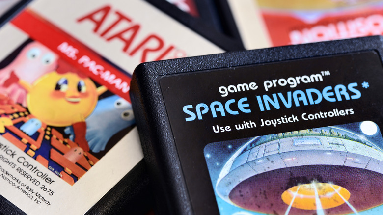 Pile of retro Atari game cartridges