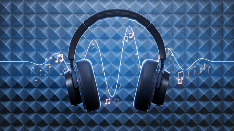A soundwave passing over a pair of headphones.