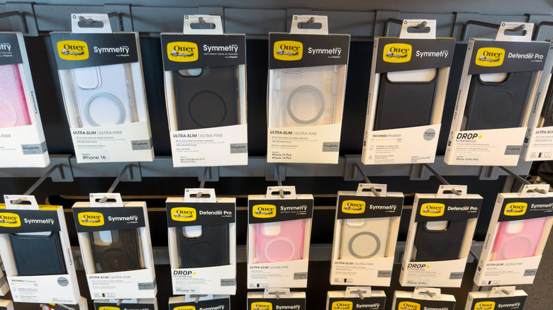 A store wall lined with Otterbox phone cases in different sy