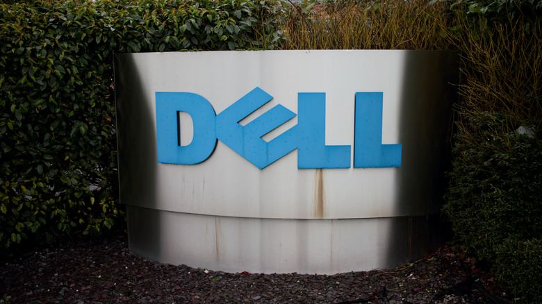 The Dell logo surrounded by bushes