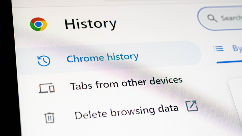 Google Chrome open, showing the Chrome History option in its settings