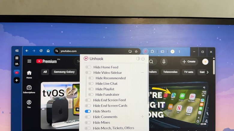 Computer monitor showing YouTube browser with Unhook Hide Shorts toggle