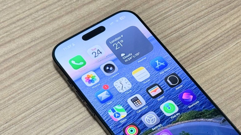 An iPhone on a table running iOS 26