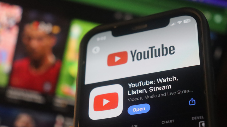 Installing the YouTube app on the iPhone.