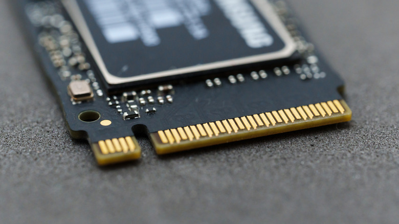 A closeup of an NVMe SSD showing its connector