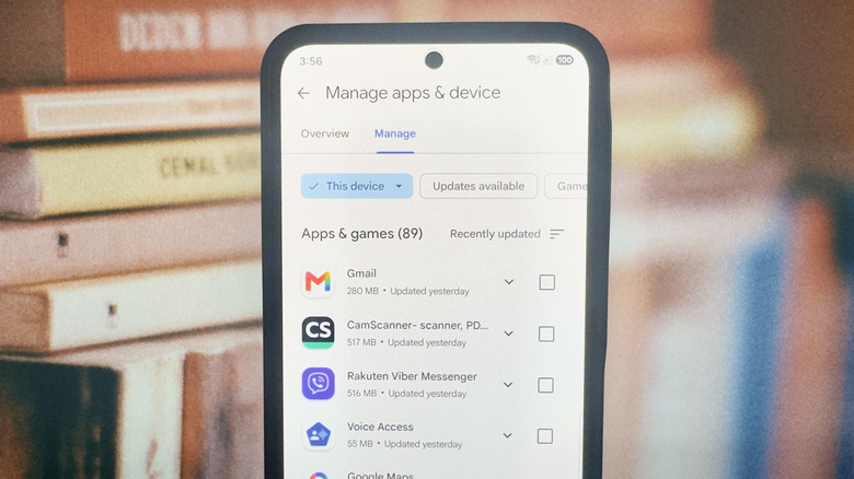 Android phone showing Google Play Store app list to find hidden apps