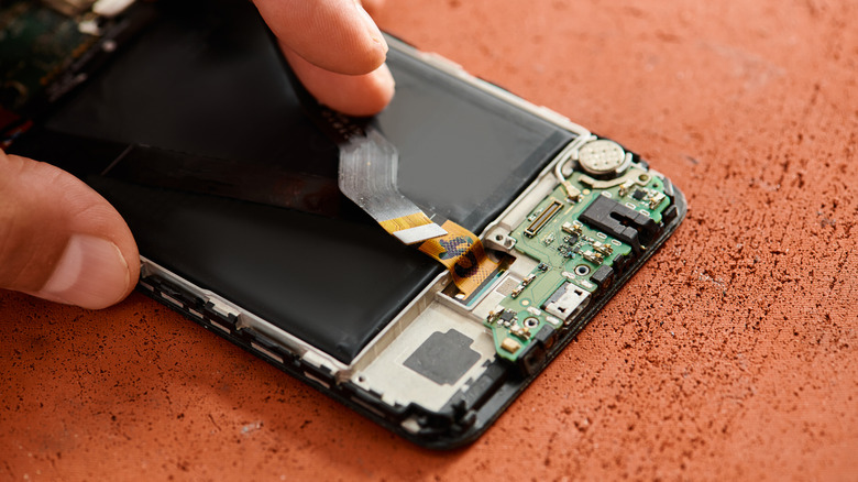 Image showing a phone's display being replaced.