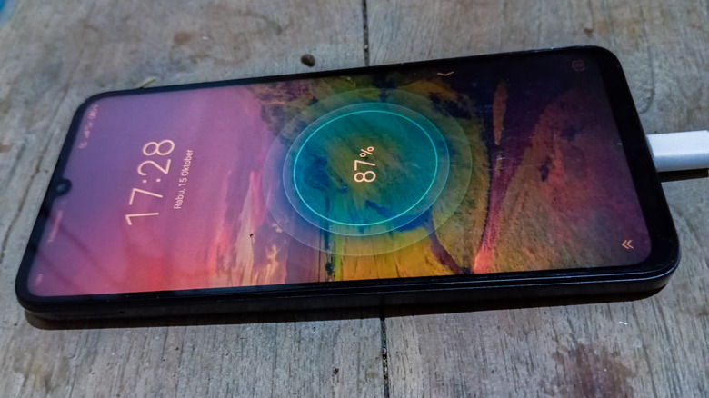 An Android phone charging up.