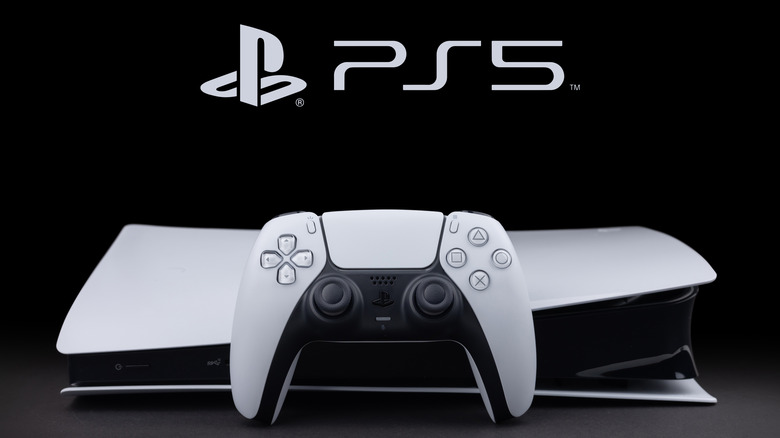 PlayStation 5 DualSense controller infront of the PlayStation 5 console with the PS5 logo above it