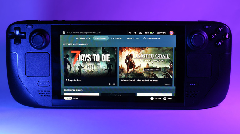 Steam Deck facing forward, with game title cards showing on screen