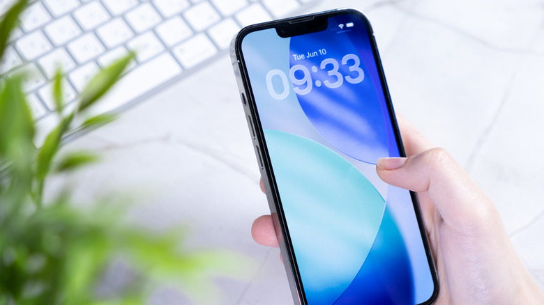 An iPhone showing the iOS lock screen