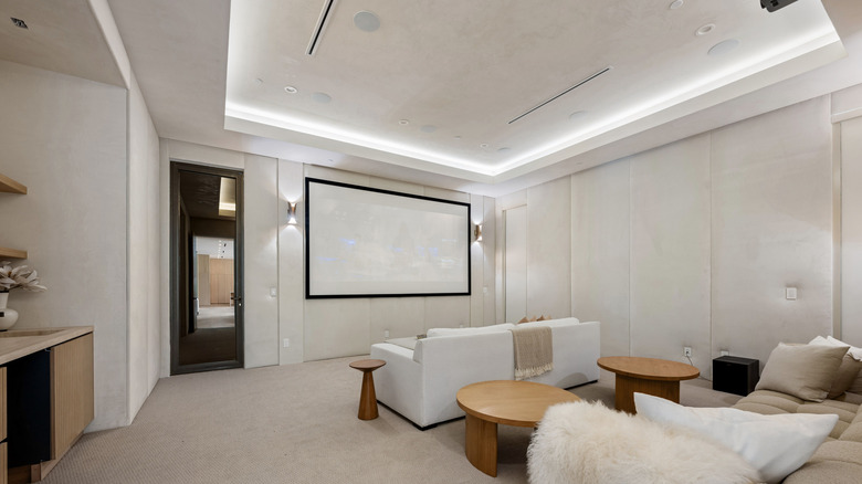 A home theater with visible ceiling speakers