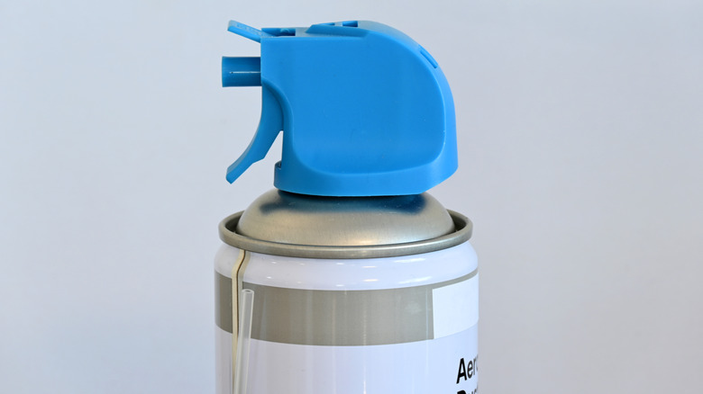 The top of a can of compressed air duster.