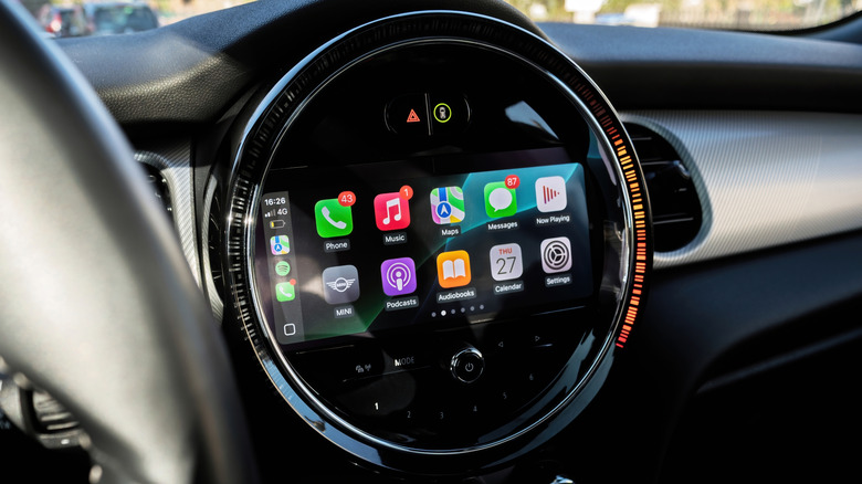 An infotainment system inside a Mini displaying Apple CarPlay