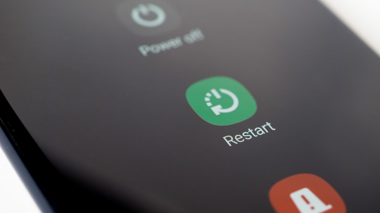 The restart and power off buttons on a smartphone