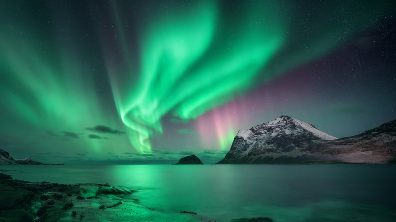 Aurora borealis over mountains