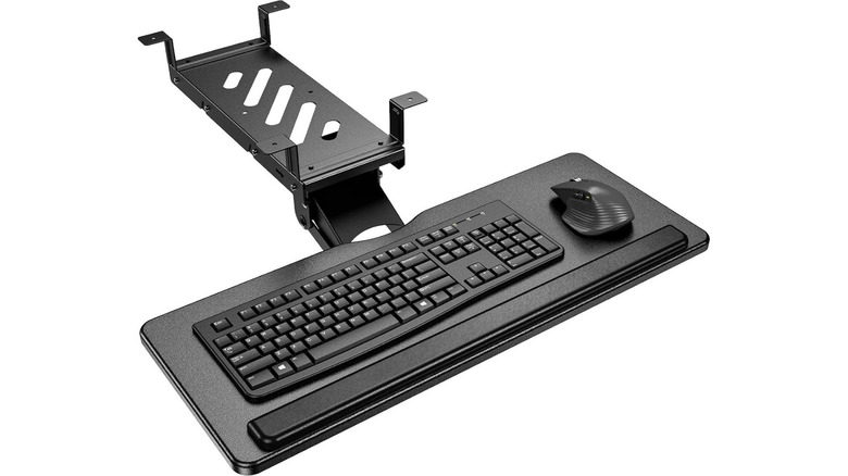 A black keyboard tray with a keyboard and mouse on it