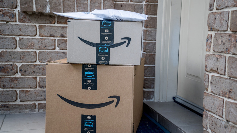Amazon Prime deliveries at a house's front door.