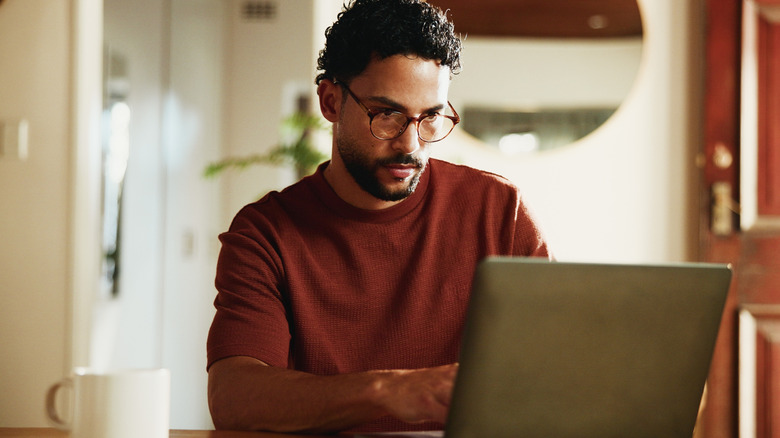 A man using a laptop