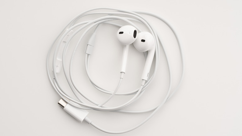 A pair of white Apple EarPods.