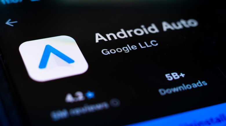 Android Auto store page on Android phone up close with logo in view.