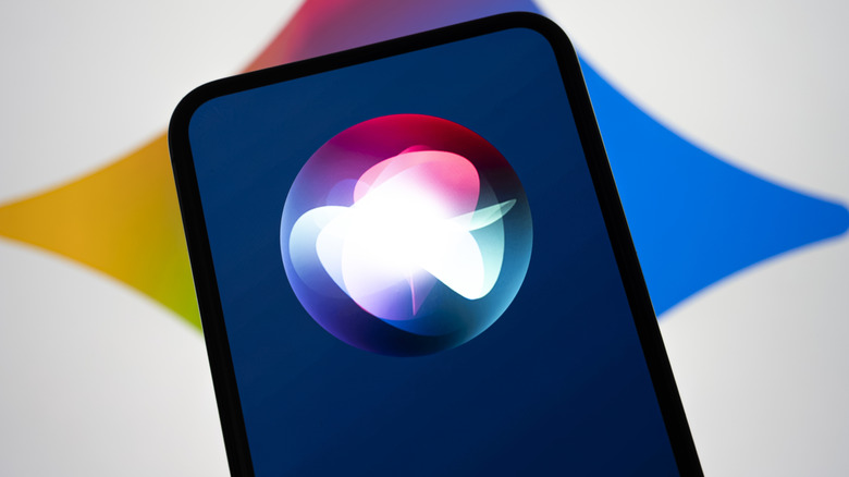 An iPhone with Siri logo in front of the Google Gemini logo