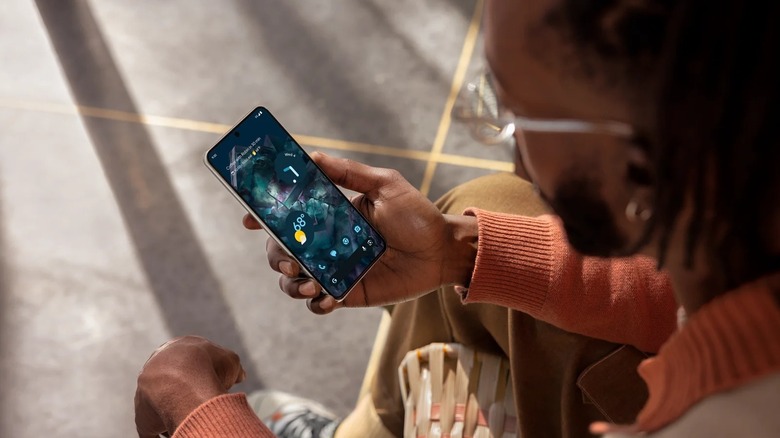 Man holding Google Pixel phone