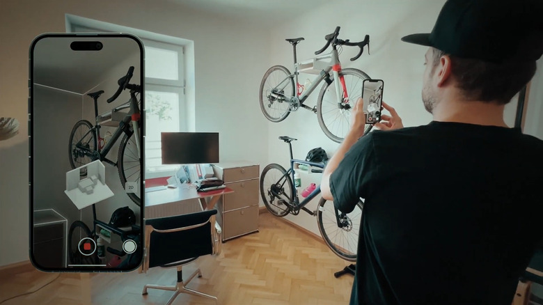 Man using magicplan app with LiDAR scan to scan room