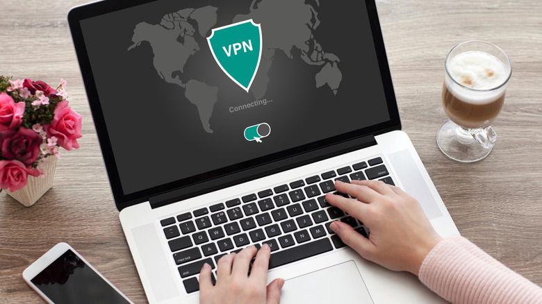 A VPN app screen on a laptop.