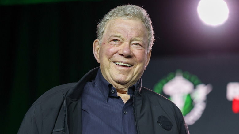 William Shatner smiling on a stage