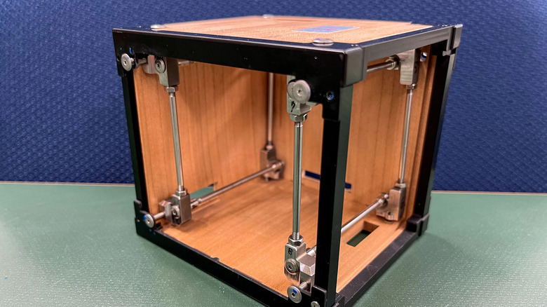 close-up of lignosat wooden satellite