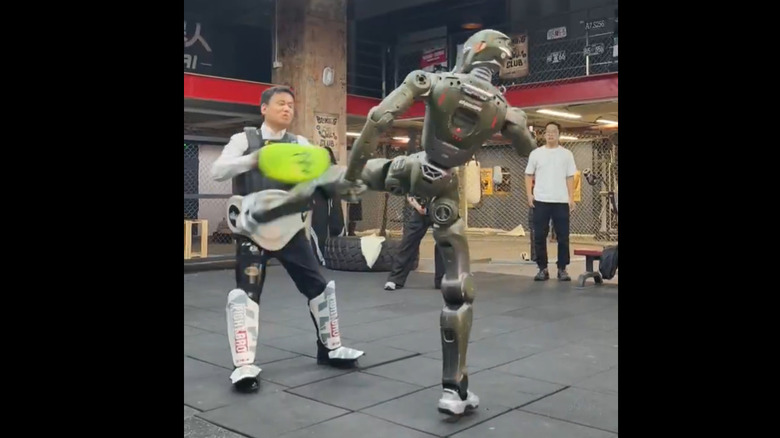 EngineAI's T800 kicking its company's CEO