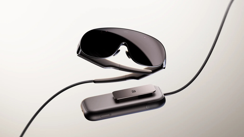 The Meta VR glasses attached to the compute and battery puck