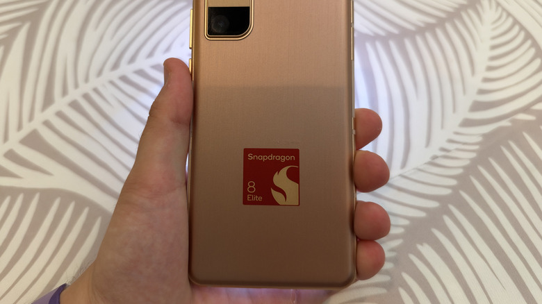 Reference device phone with Snapdragon 8 Elite Gen 6 chip logo printed on the back