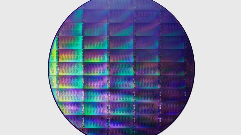 Closeup of a 300-millimeter quantum wafer against a white background.