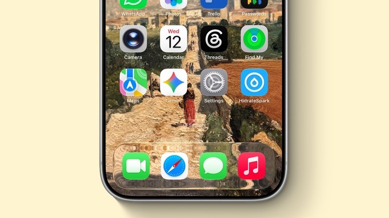 iPhone with several apps on Home Screen, including Apple Maps