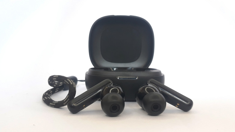 Anker Soundcore earbuds outside their charging case.