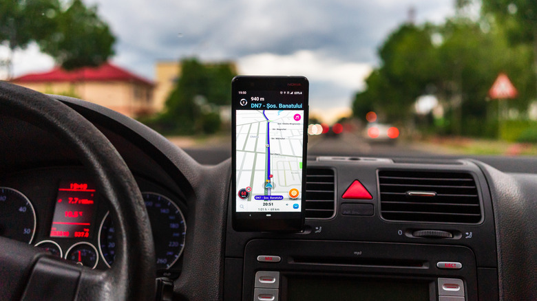 Waze map app displaying travel route on smartphone screen