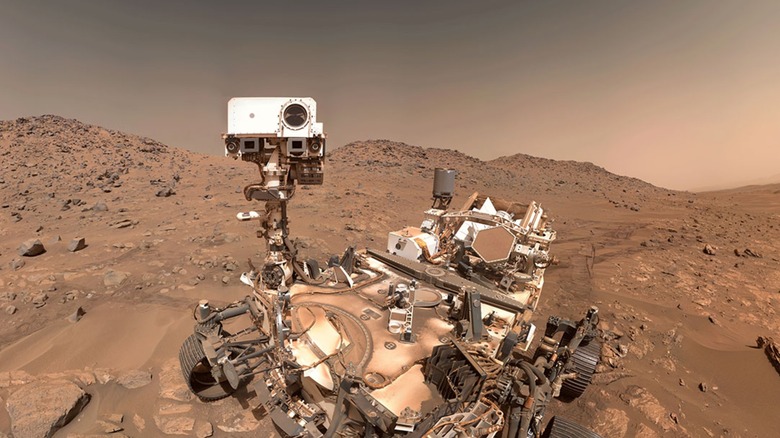 NASA Perseverence Rover with Mars landscape in background