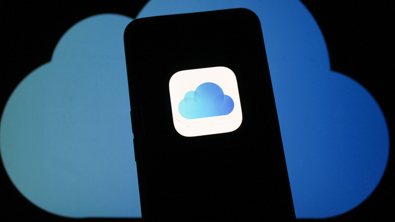 The iCloud logo shown on a smartphone screen.