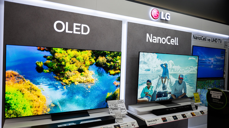 A display wall of LG TVs at a retail outlet.