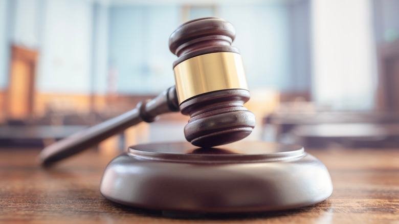 A legal gavel in a courtroom