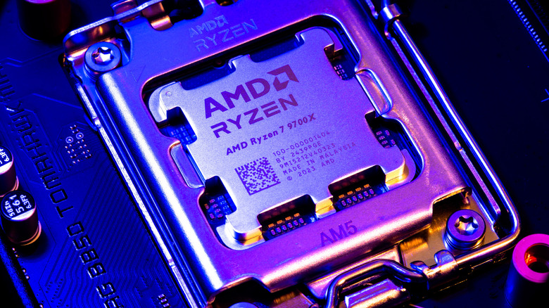 Close-up of AMD Ryzen processor installed in an AM5 motherboard socket.