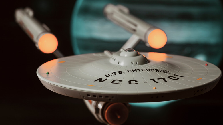 A toy of the USS Enterprise from Star Trek.