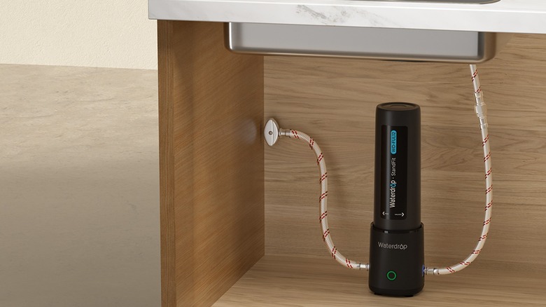 The Waterdrop Filter 10UA Pro Under-Sink Water Filter under a sink.