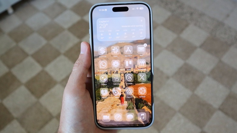 iOS 26's new Home Screen with updated Liquid Glass icons