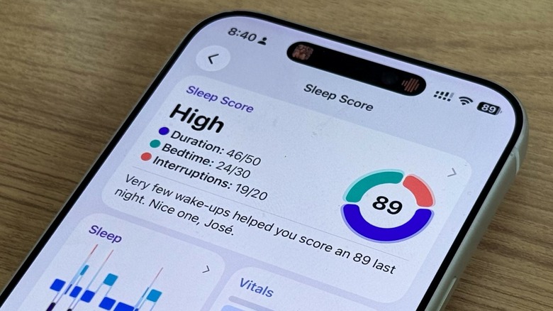An iPhone highlighting iOS 26's Sleep Score feature inside Apple's Health app