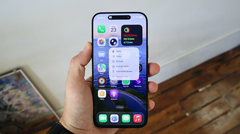 A hand holding an iPhone 16 Pro Max