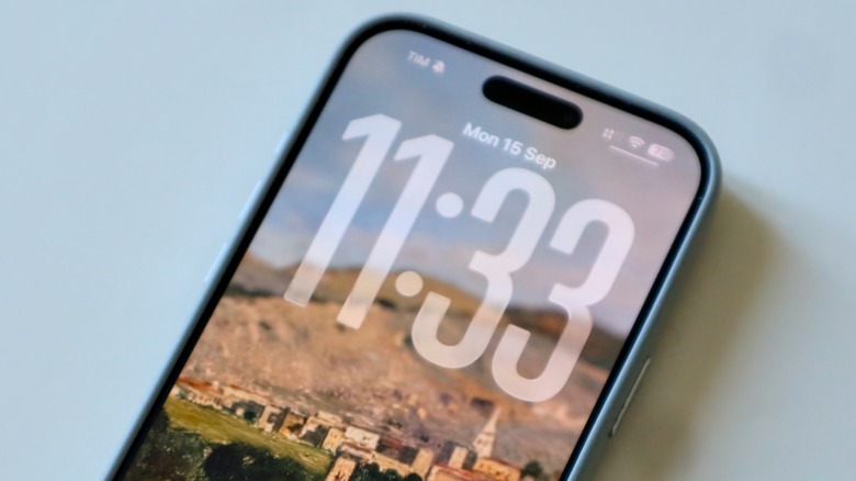 An iPhone Lock Screen on iOS 26